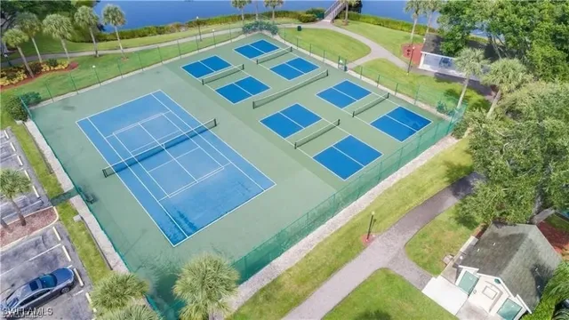 a view of a swimming pool with a yard