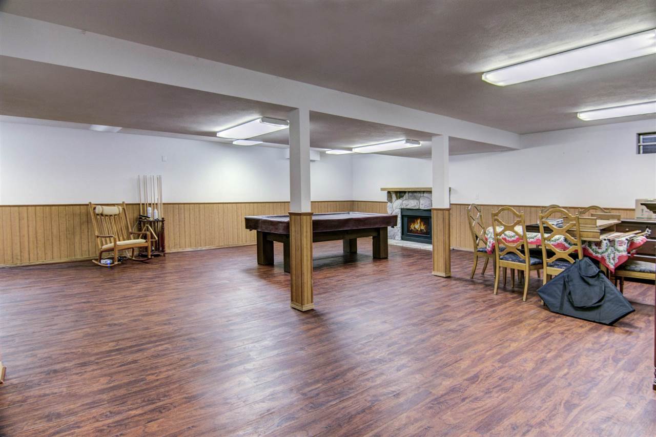 7196 Sentinel Road Rockford, IL 61107 - Photo 20 of 24 a view of a room with furniture and wooden floor
