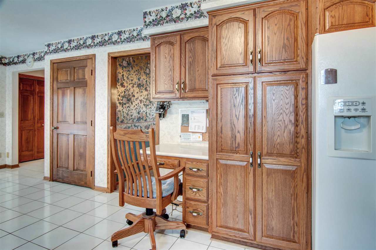 7196 Sentinel Road Rockford, IL 61107 - Photo 6 of 24 a view of a entryway with wooden door