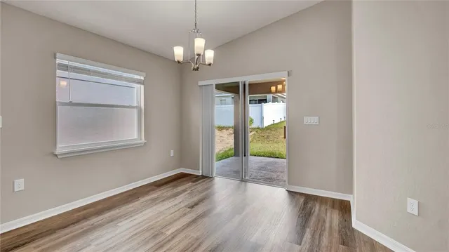 a bathroom with a granite countertop sink and vanity