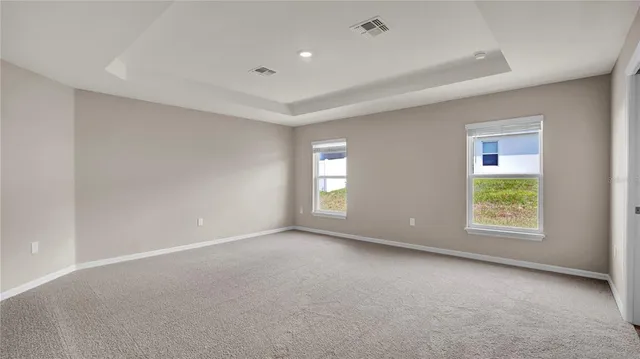a bathroom with a shower sink and mirror