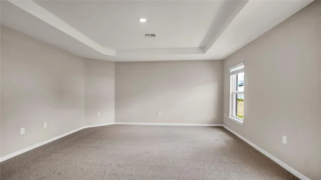 a bathroom with a toilet and shower