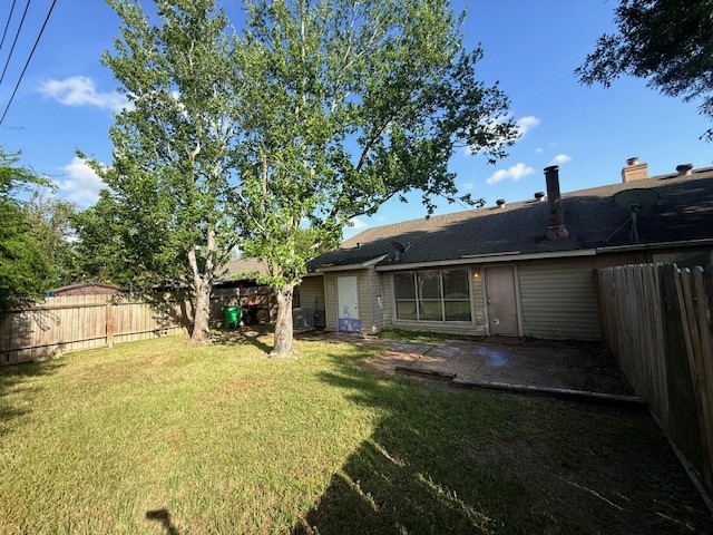 2339 Autumn Springs Lane Spring, TX 77373 - Photo 12 of 12 a view of a backyard with a garden and plants