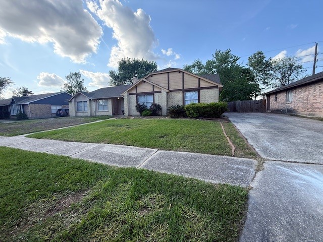 2339 Autumn Springs Lane Spring, TX 77373 - Photo 2 of 12 a view of a big yard in front of a house