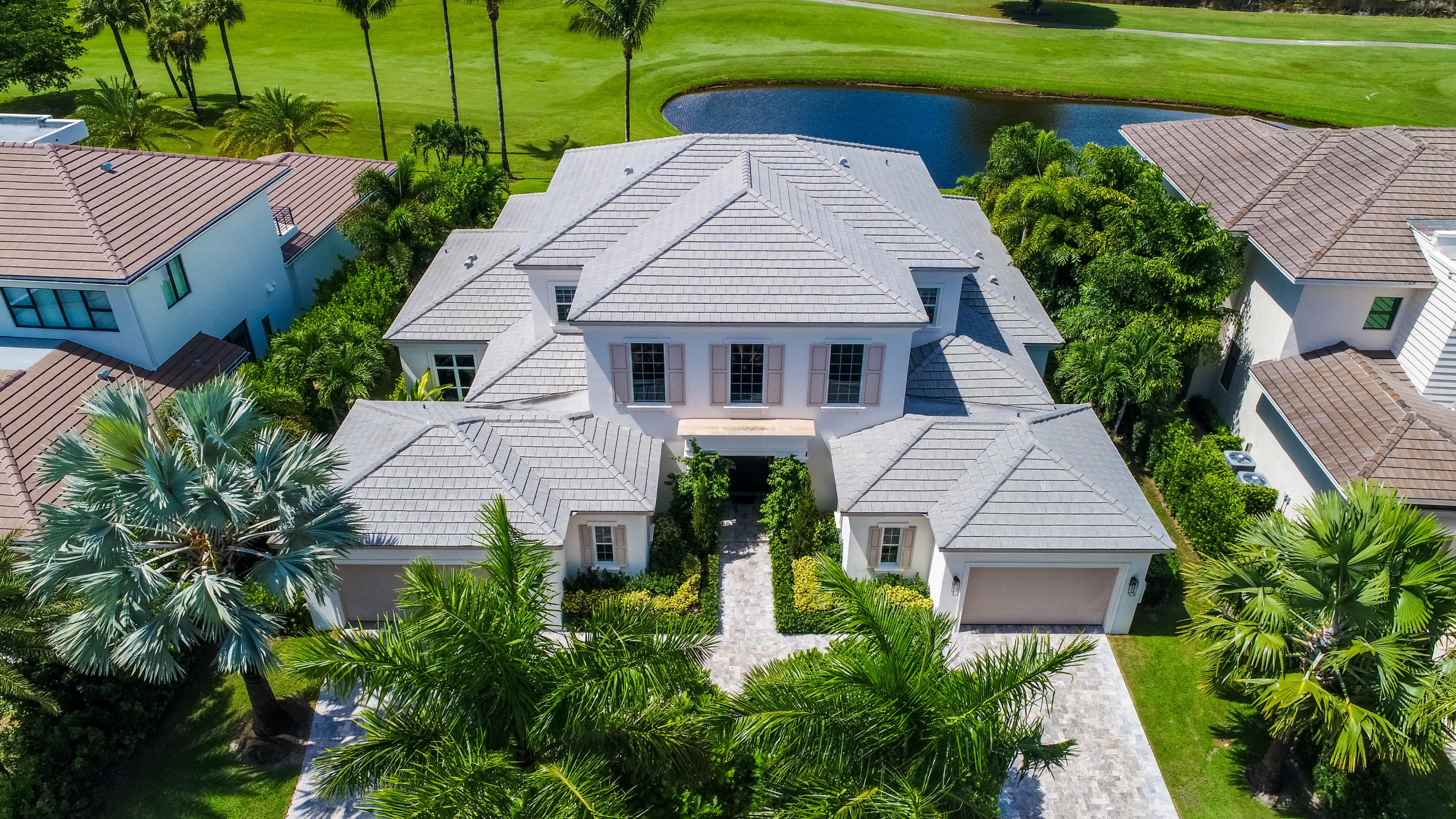 7140 Queenferry Circle Boca Raton, FL 33496 - Photo 2 of 51 an aerial view of a house with a yard