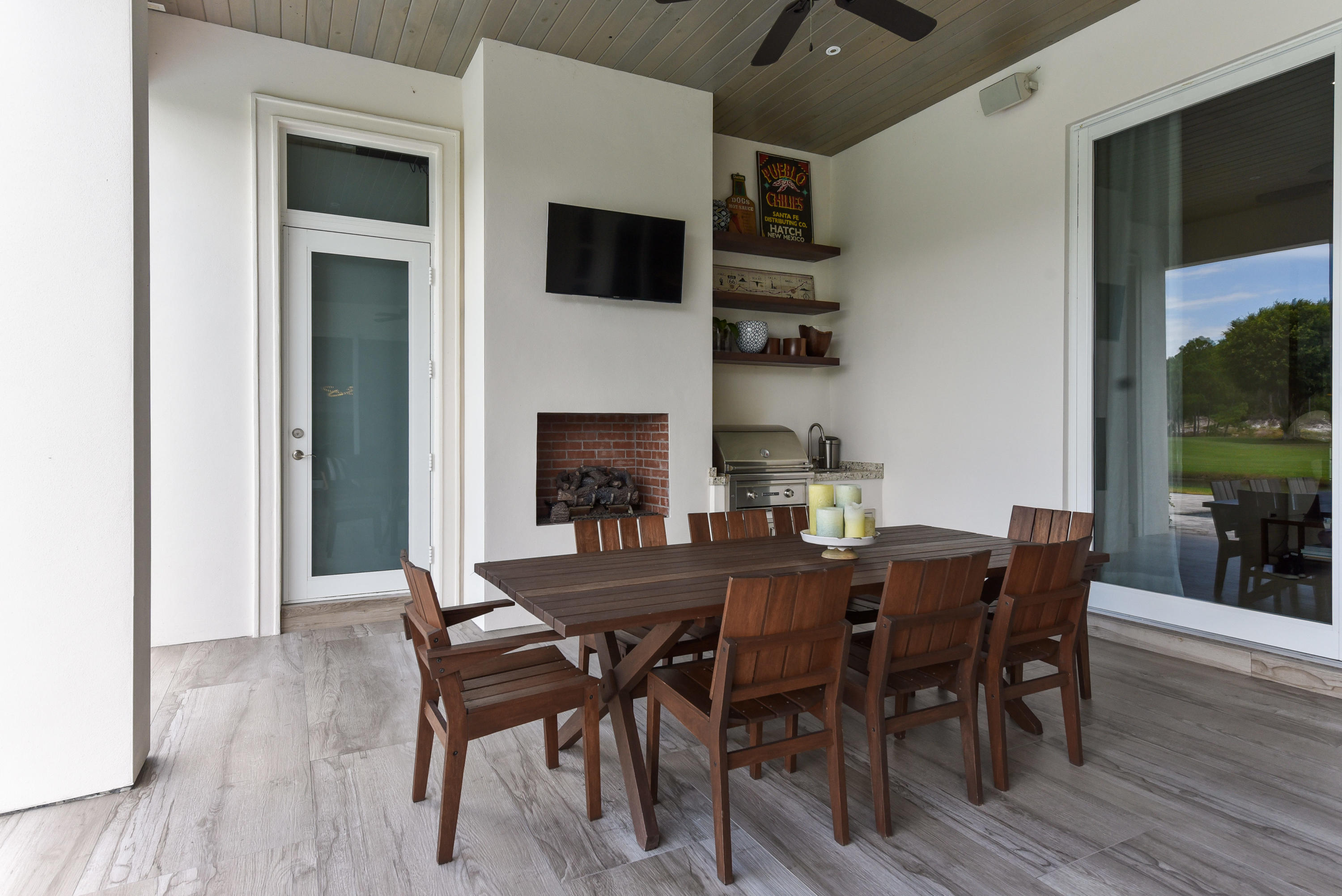 7140 Queenferry Circle Boca Raton, FL 33496 - Photo 12 of 51 a view of a dining room with furniture and wooden floor