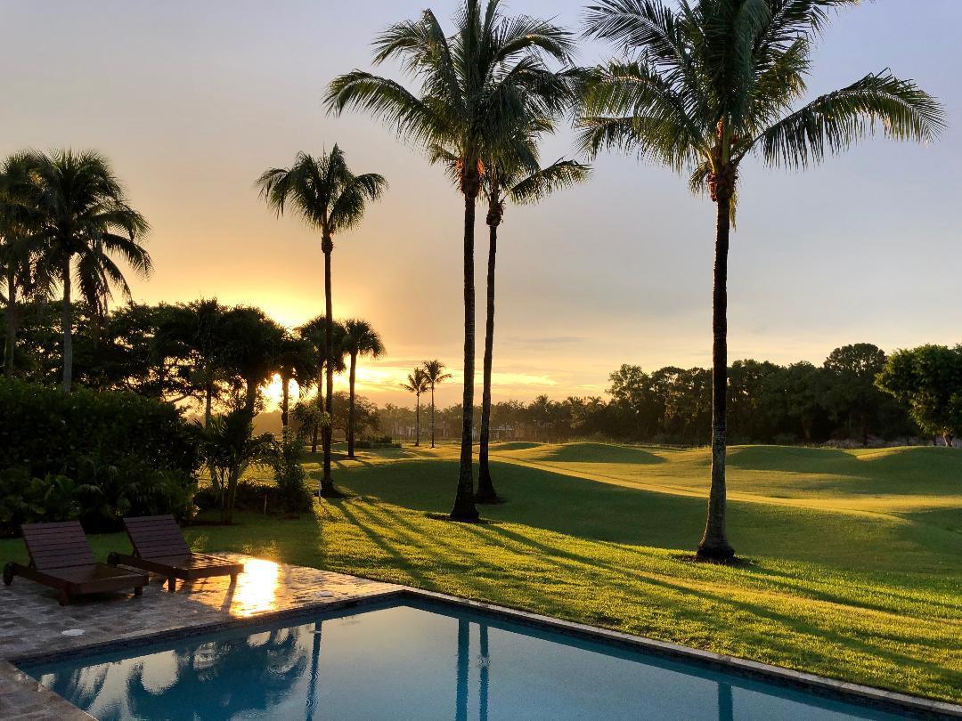 7140 Queenferry Circle Boca Raton, FL 33496 - Photo 16 of 51 a view of swimming pool with a table and chairs