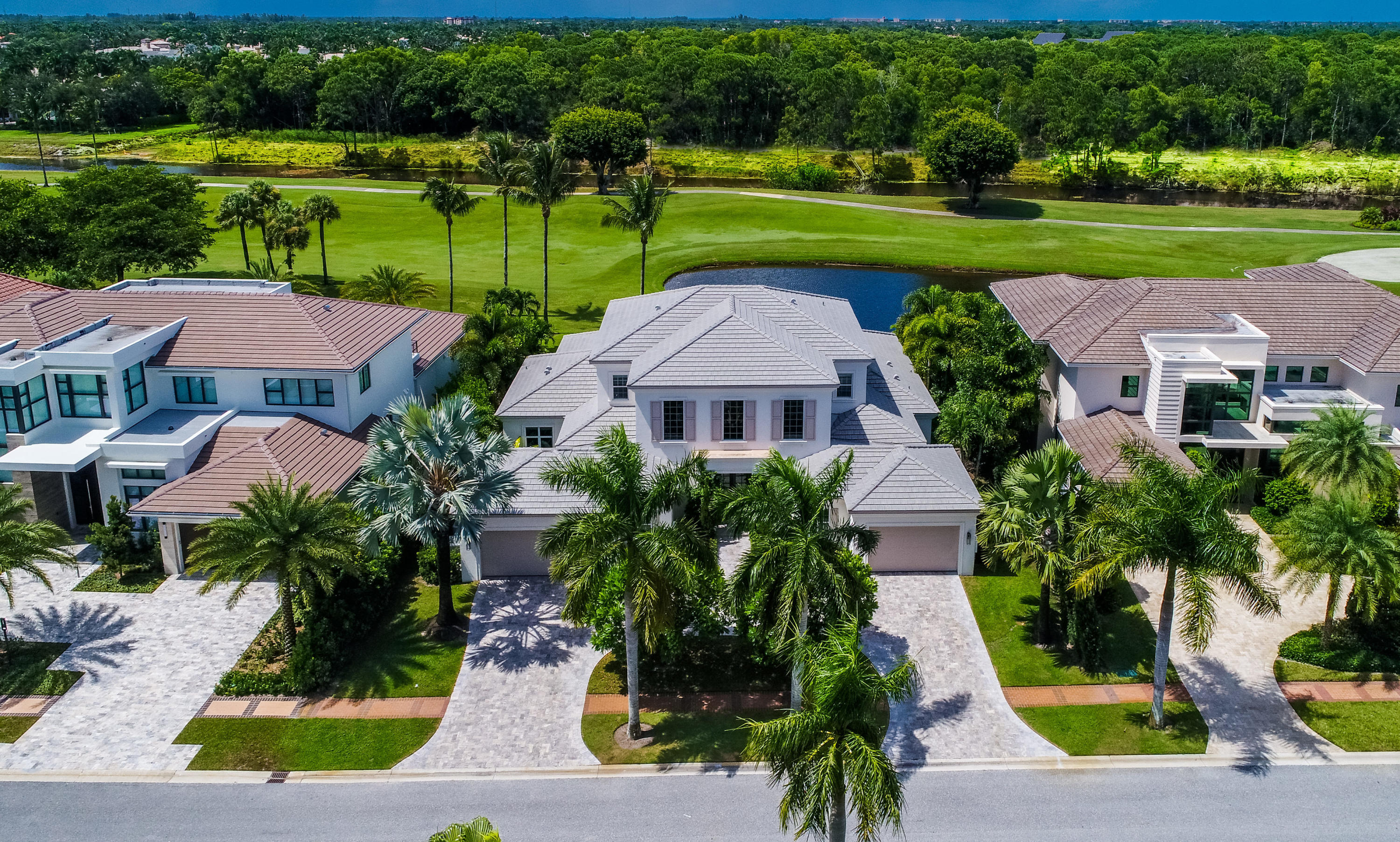 7140 Queenferry Circle Boca Raton, FL 33496 - Photo 18 of 51 a aerial view of a house with a yard and lake view
