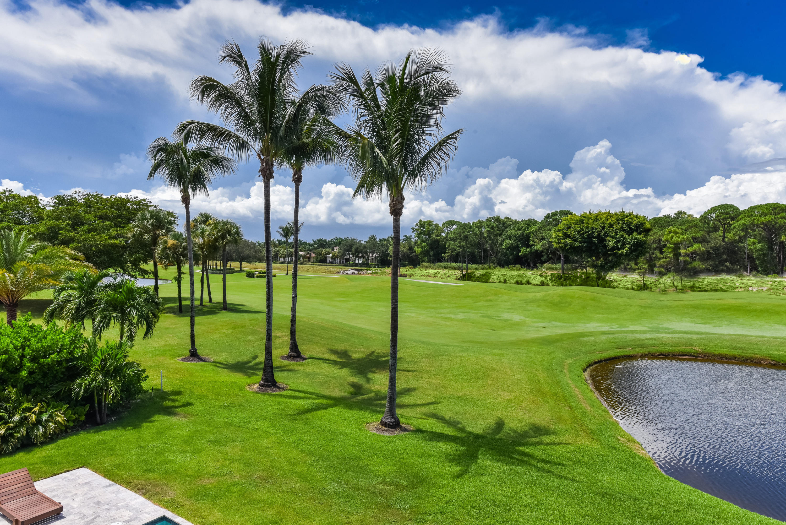 7140 Queenferry Circle Boca Raton, FL 33496 - Photo 8 of 51 a view of a golf course with a garden