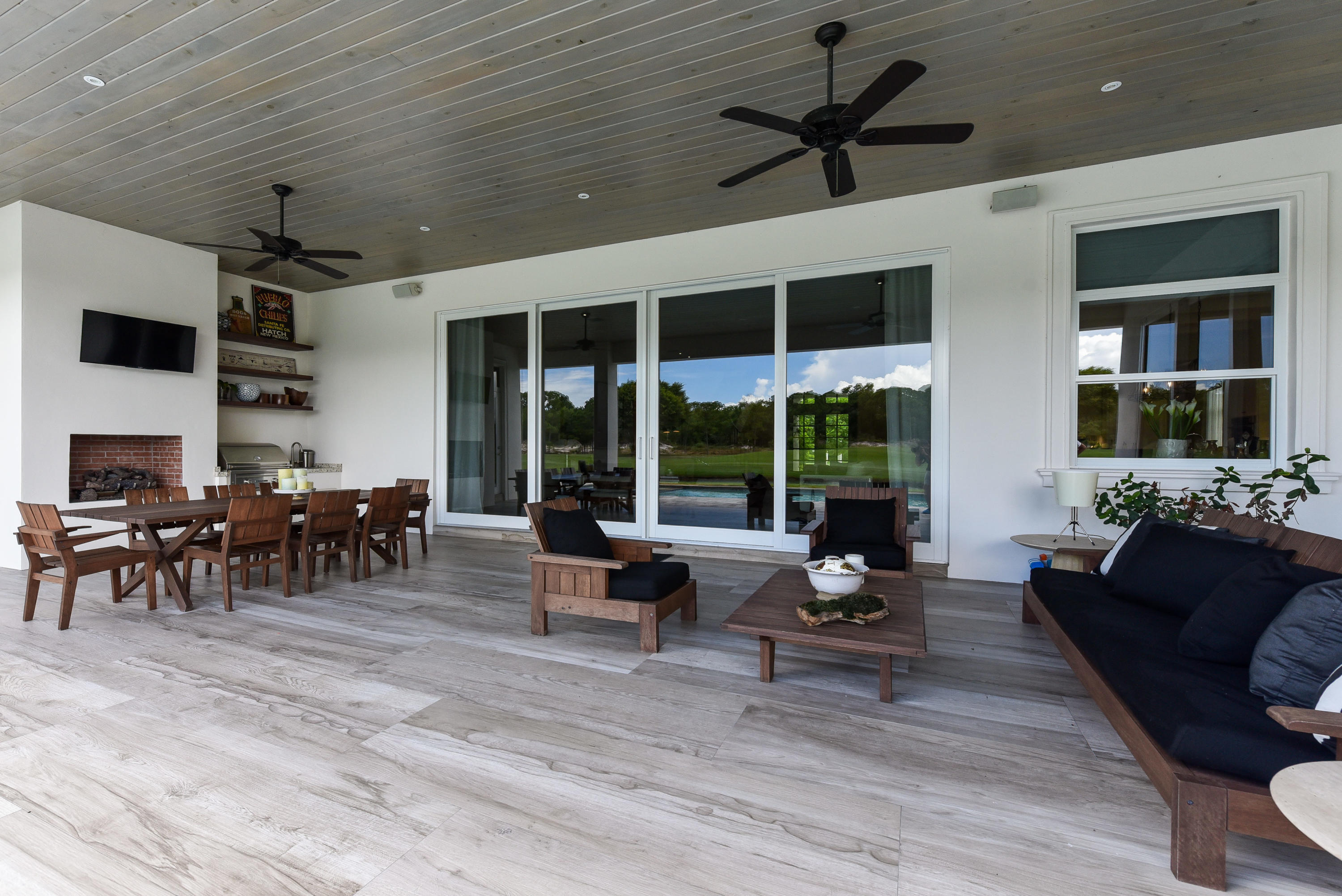 7140 Queenferry Circle Boca Raton, FL 33496 - Photo 10 of 51 a living room with furniture and a large window