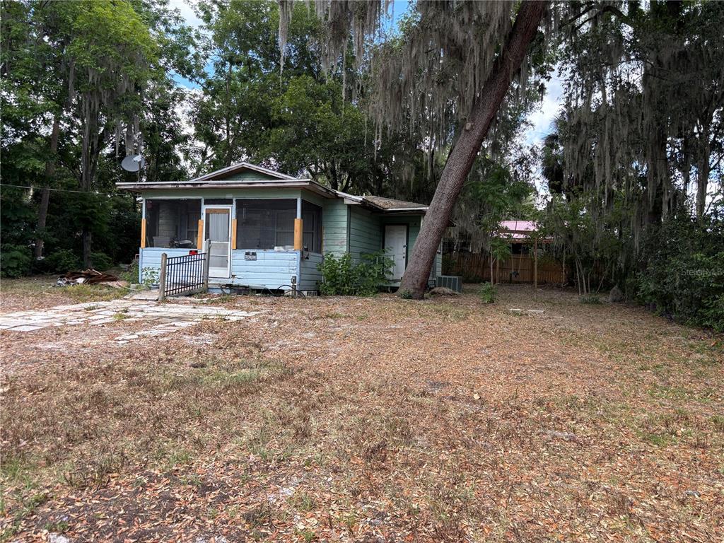 221 South Raven Terrace Inverness, FL 34450 - Photo 1 of 4 a front view of a house with a yard