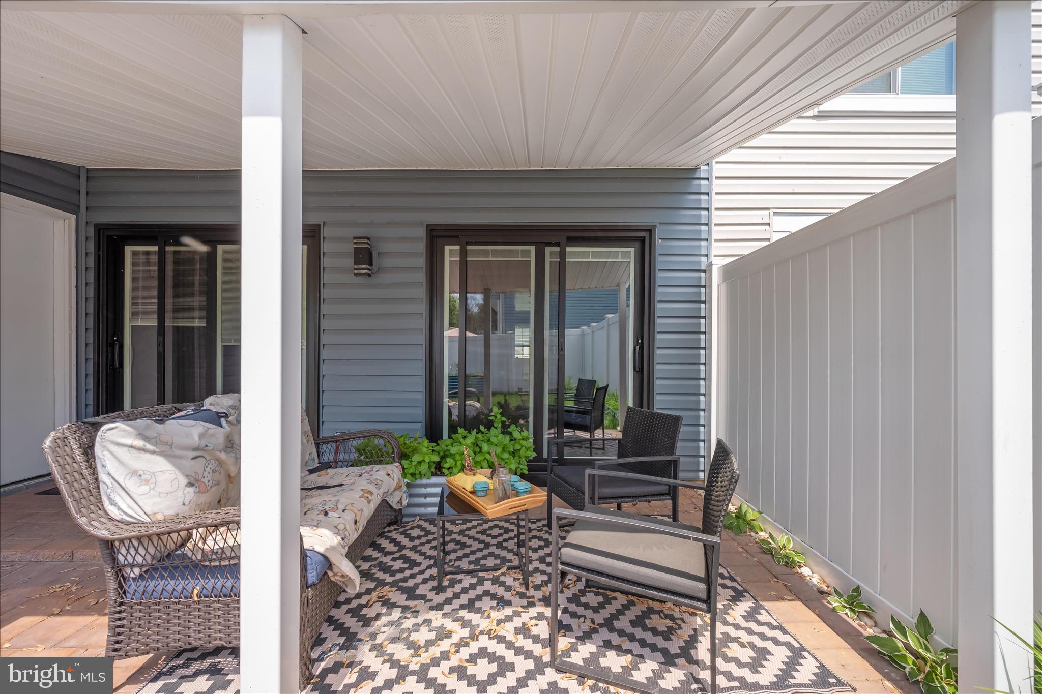 330 Heather Ridge Drive Frederick, MD 21702 - Photo 24 of 39 a view of a porch with chairs and potted plants