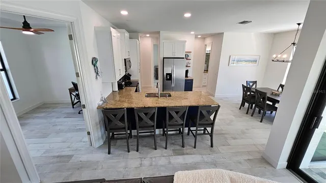 a view of a dining room with furniture