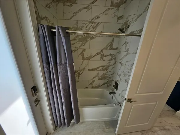 a bathroom with a bathtub