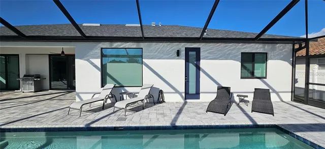 a view of living room with furniture and a table