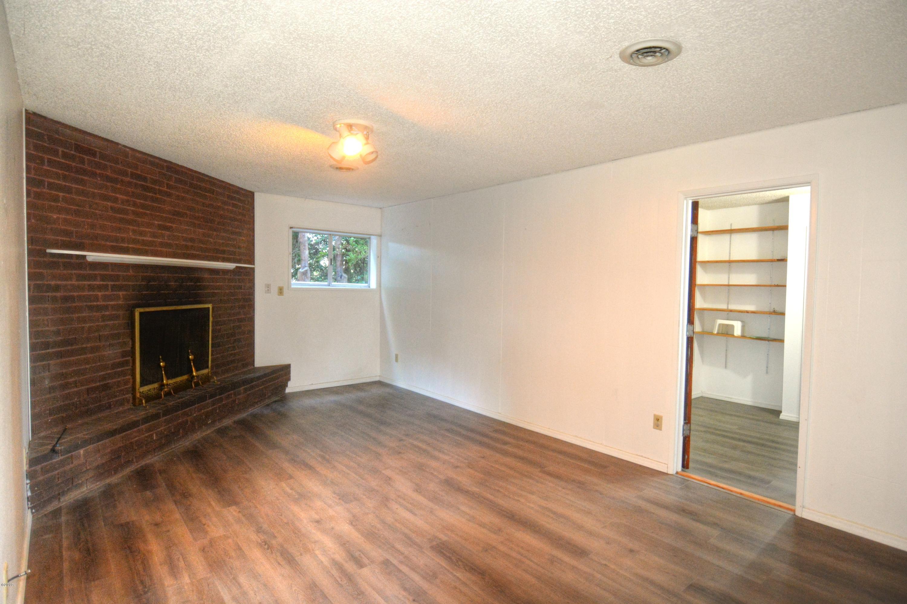 507 Southeast Moffitt Road Waldport, OR 97394 - Photo 21 of 30 Family Room Lower Level