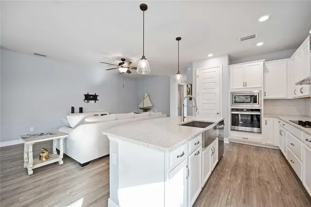 a view of kitchen and sink