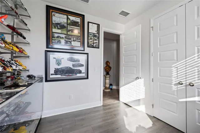 a view of a house with swimming pool and porch