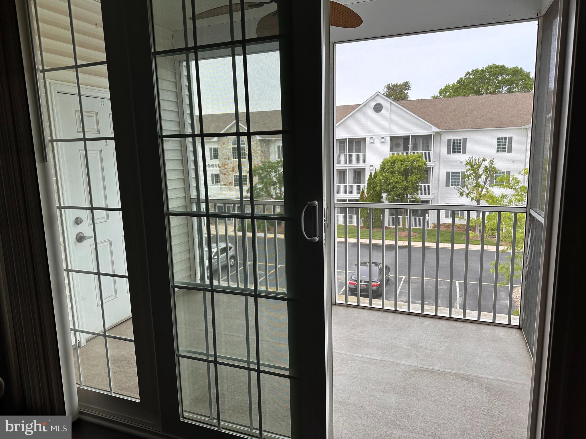 30619 Cedar Neck Road, Unit 1301 Ocean View, DE 19970 - Photo 34 of 42 Screened Porch with Ceiling Fan
