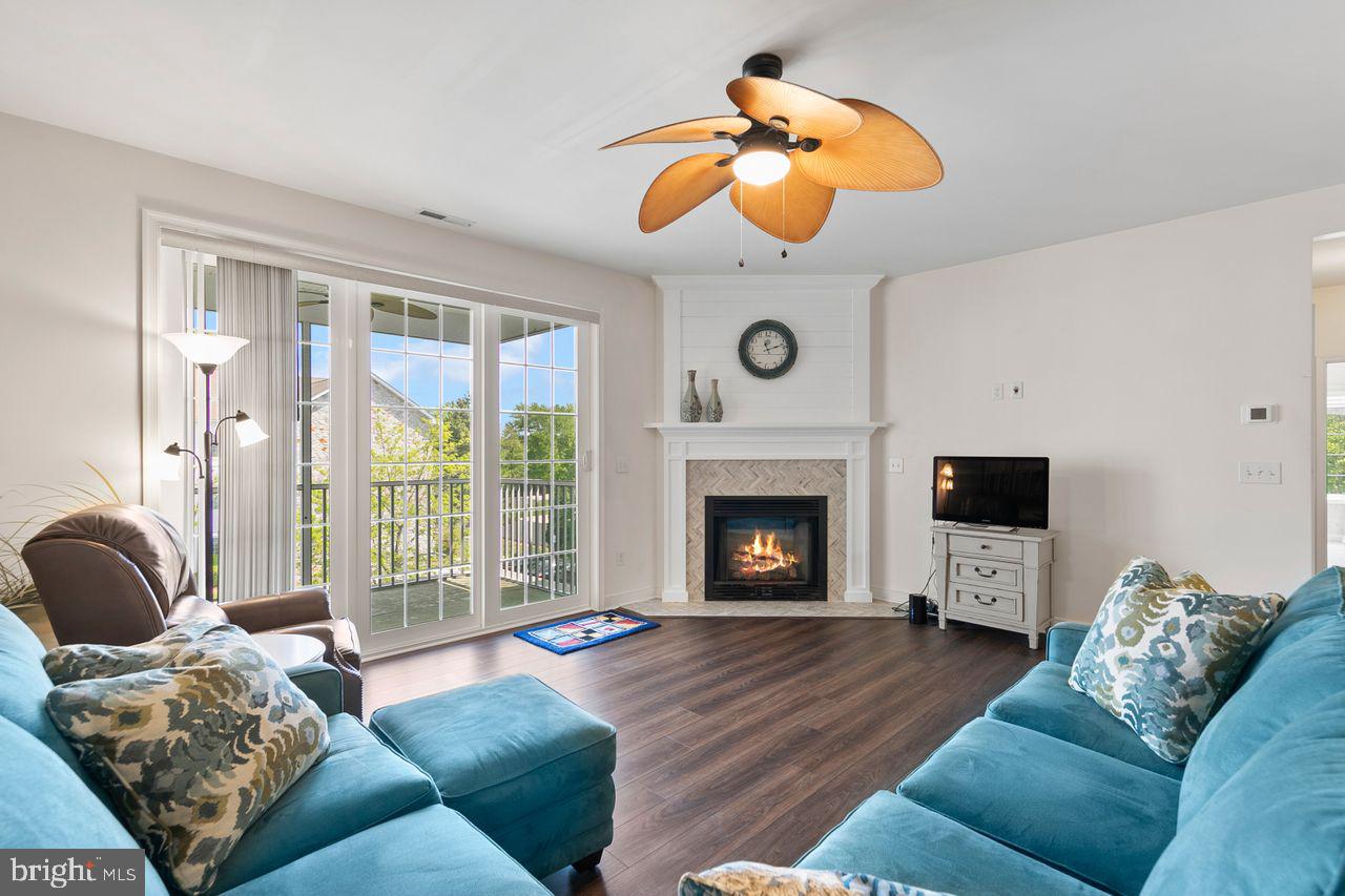 30619 Cedar Neck Road, Unit 1301 Ocean View, DE 19970 - Photo 5 of 42 Sliders to Screened Porch