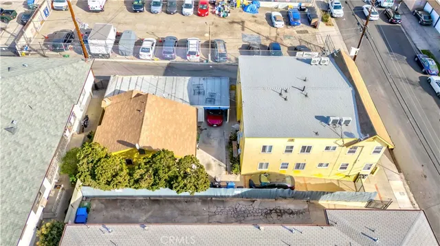 an aerial view of a city with lots of residential buildings