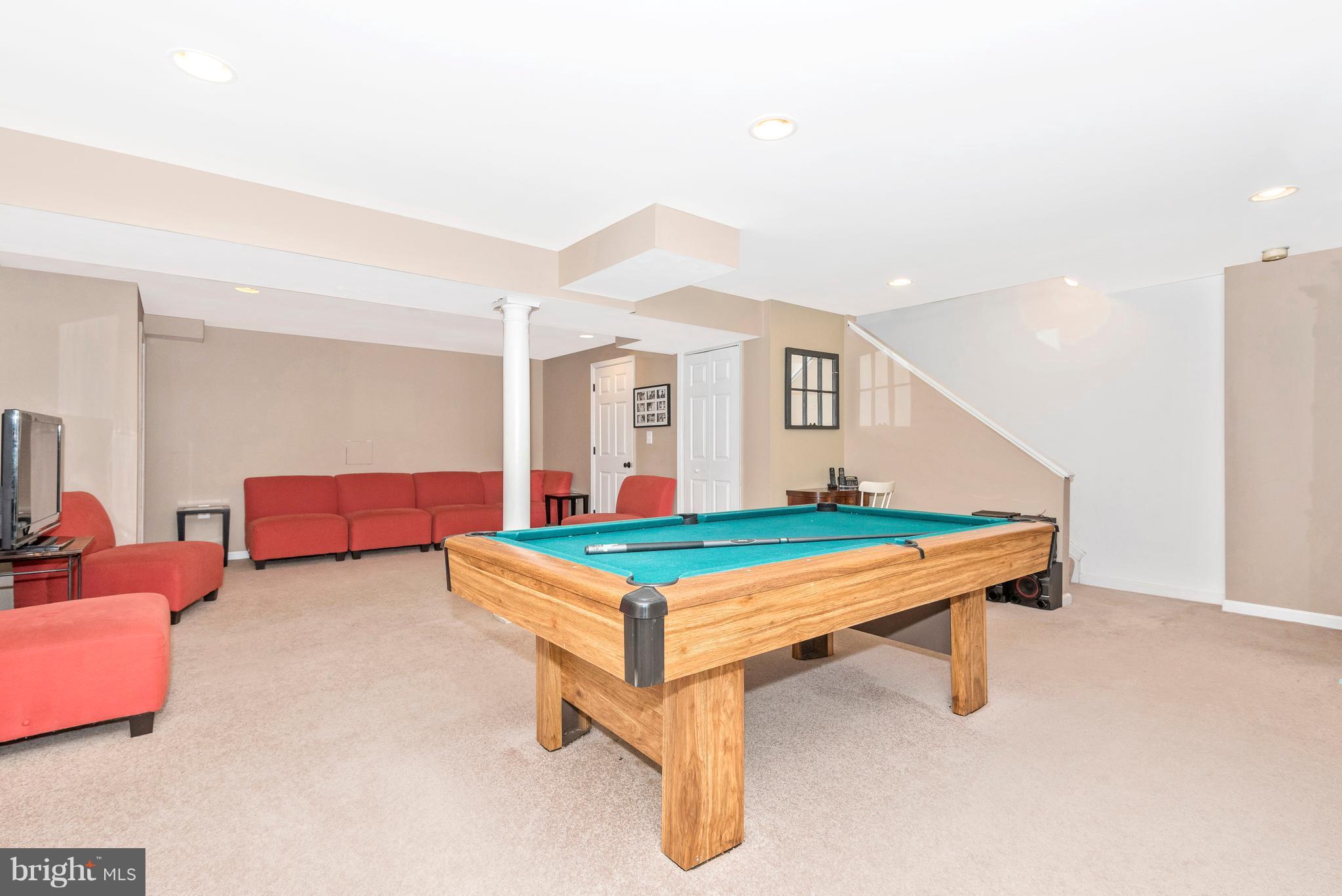 6748 Hemlock Point Road New Market, MD 21774 - Photo 20 of 30 Basement - Bright and Spacious Basement Rec Room