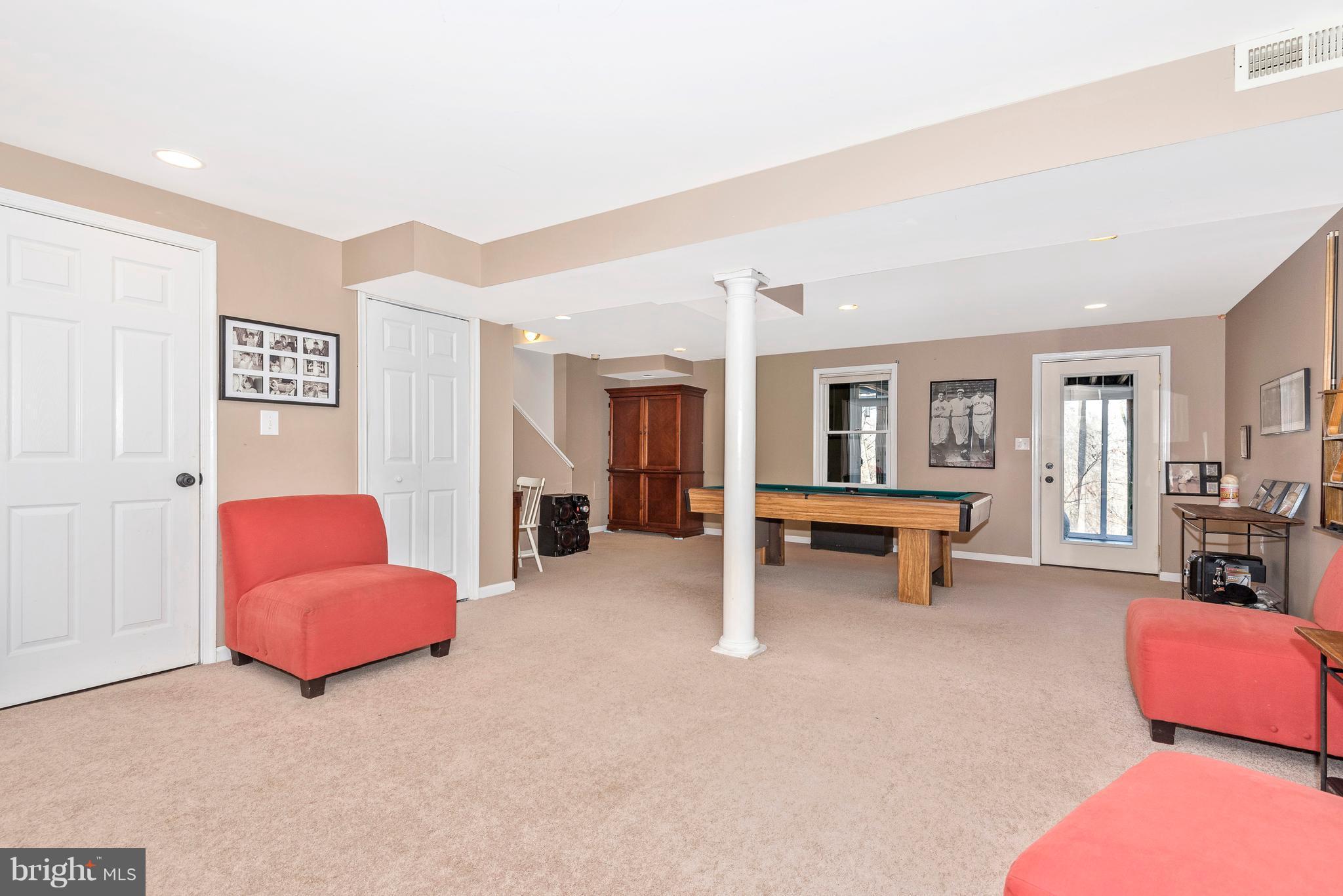 6748 Hemlock Point Road New Market, MD 21774 - Photo 21 of 30 Basement - Bright and Spacious Basement Rec Room