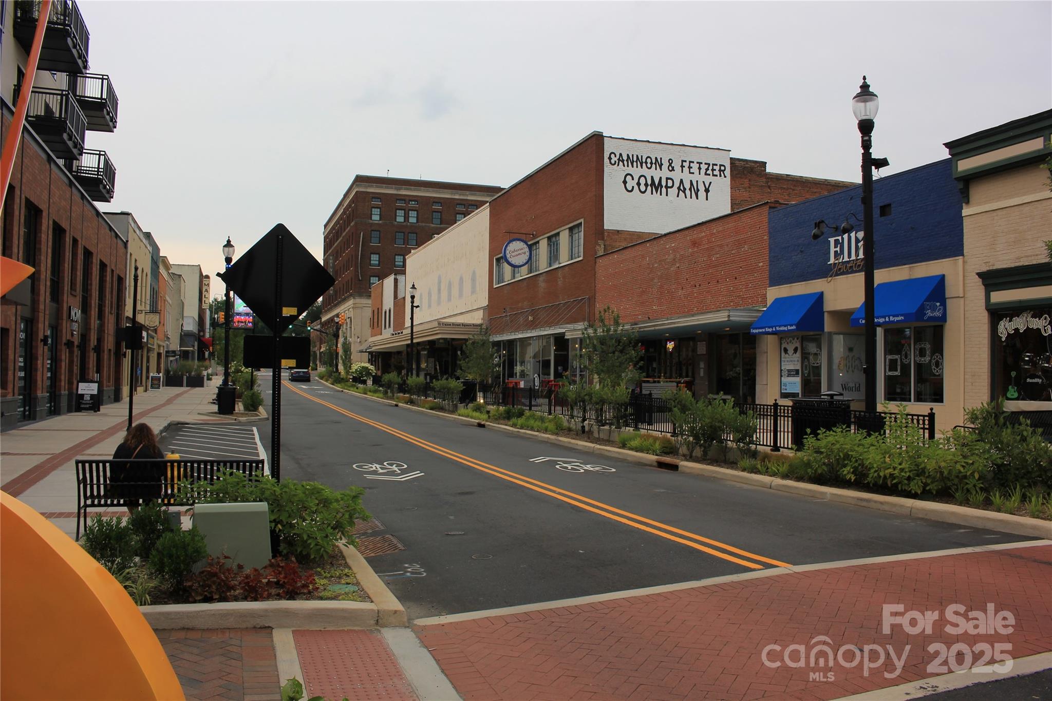 571 Union Street South Concord, NC 28025 - Photo 31 of 34 a view of a street with stores