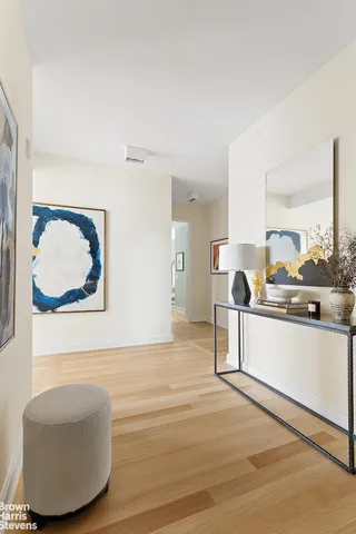 a living room with couch and a window