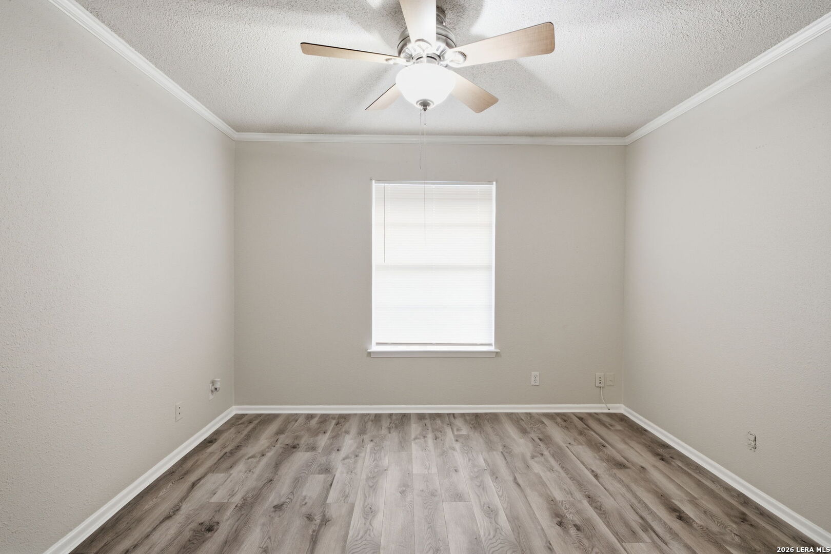 6106 Vance Jackson Road, Unit 15 San Antonio, TX 78230 - Photo 20 of 30 an empty room with a window and a fan