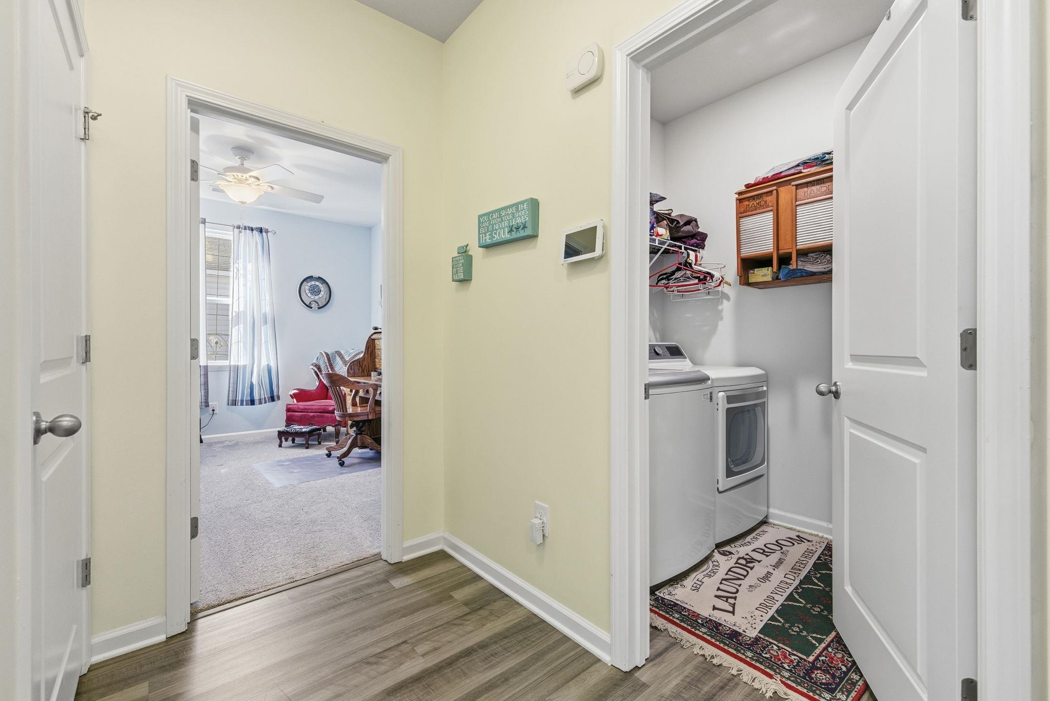 144 Legends Village Loop Myrtle Beach, SC 29579 - Photo 13 of 25 Laundry area with wood finished floors, washing machine and dryer, an office area, and a ceiling fan