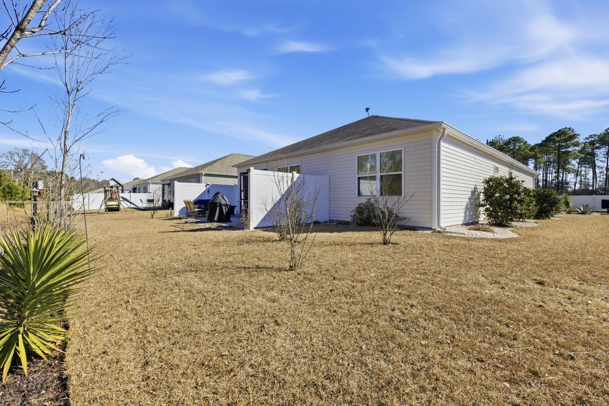 144 Legends Village Loop Myrtle Beach, SC 29579 - Photo 21 of 25 Back of property