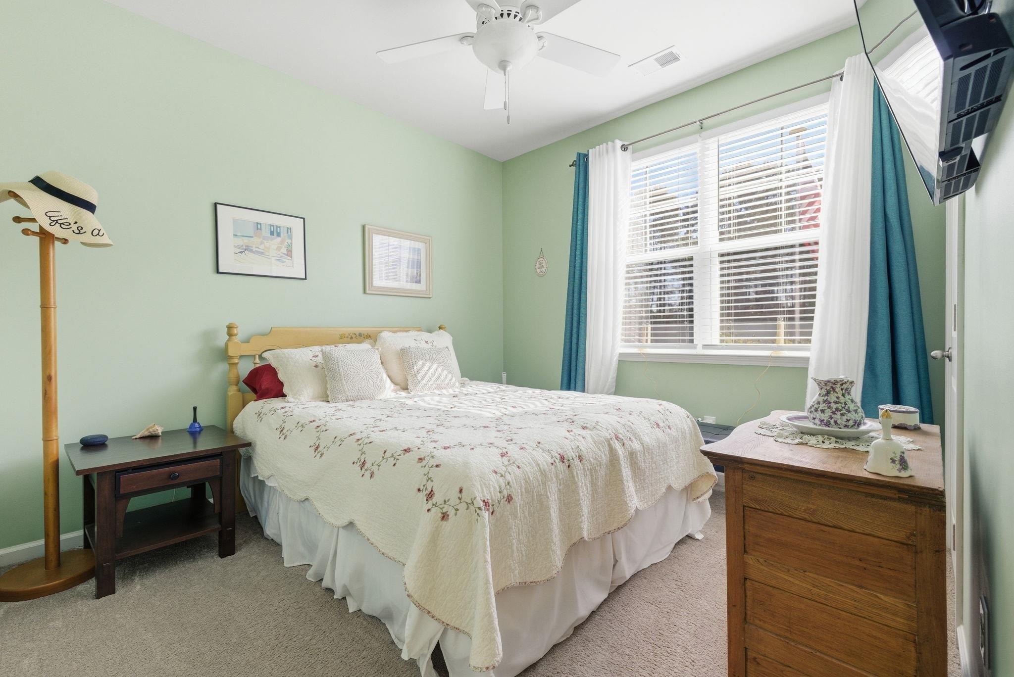 144 Legends Village Loop Myrtle Beach, SC 29579 - Photo 9 of 25 Bedroom featuring carpet and a ceiling fan