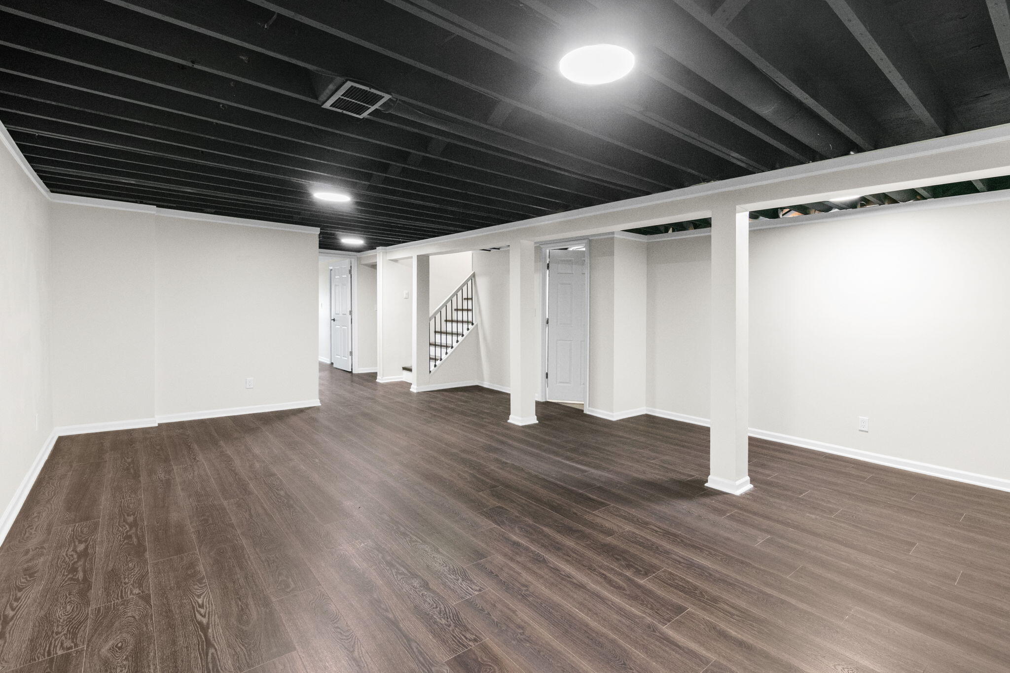 560 Free Church Drive Williams Bay, WI 53191 - Photo 22 of 28 NEW: Recreation Room 23'x17'3 Large expansive space with painted ceiling for more height.