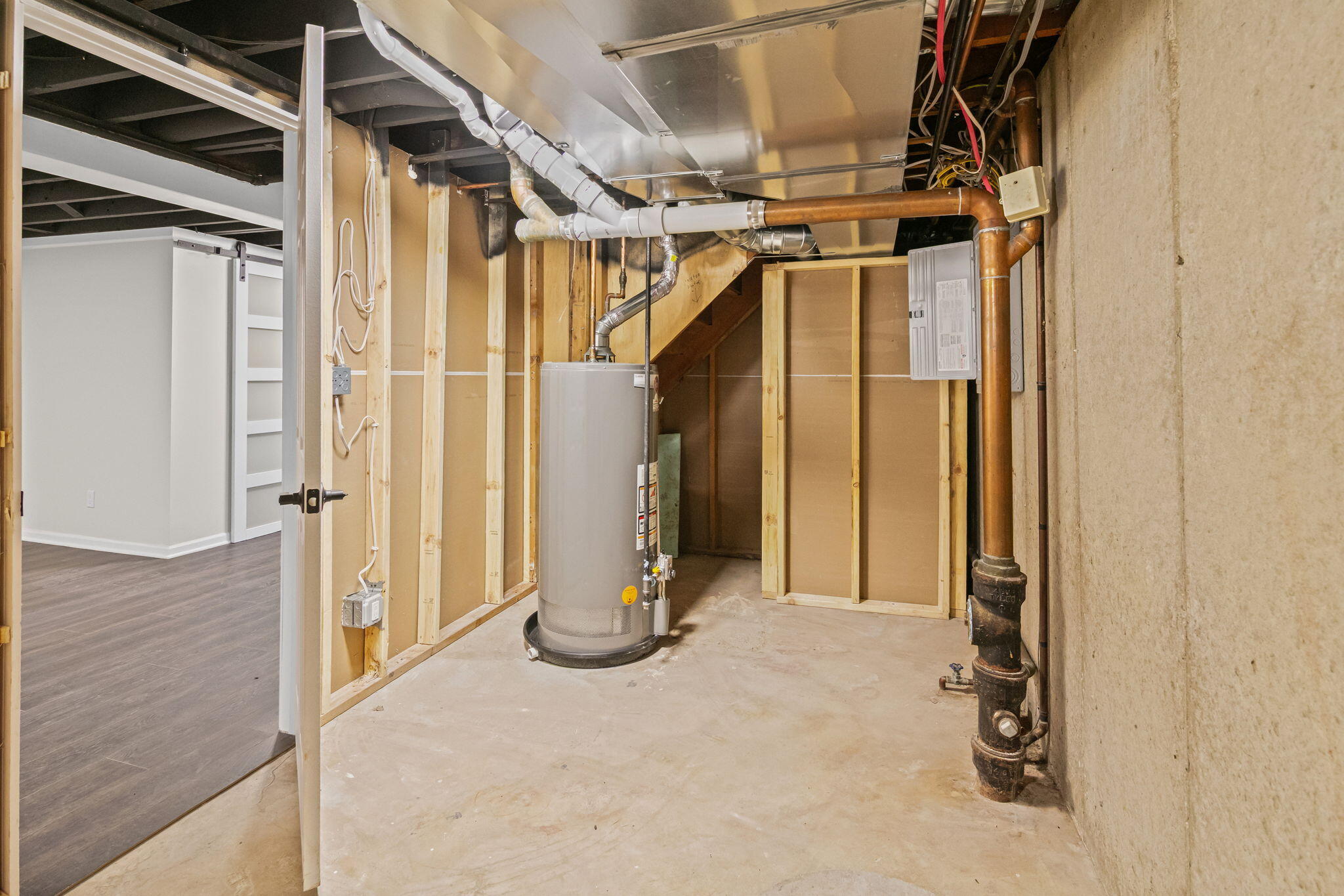 560 Free Church Drive Williams Bay, WI 53191 - Photo 23 of 28 Lower Level Unfinished Storage Utility/Mechanical Room.