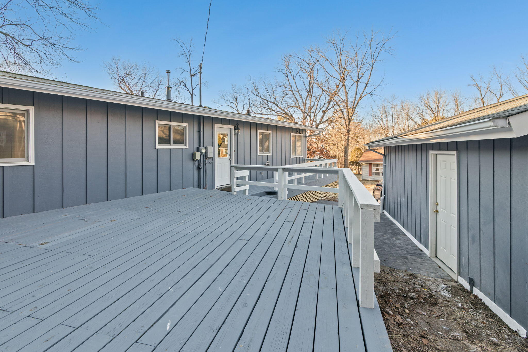 560 Free Church Drive Williams Bay, WI 53191 - Photo 24 of 28 Back Deck, East side of the home between the home and detached garage.