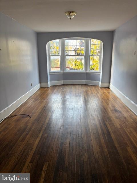 25 Chambersburg Street, Unit 2W Gettysburg, PA 17325 - Photo 2 of 5 wooden floor in an empty room with a window