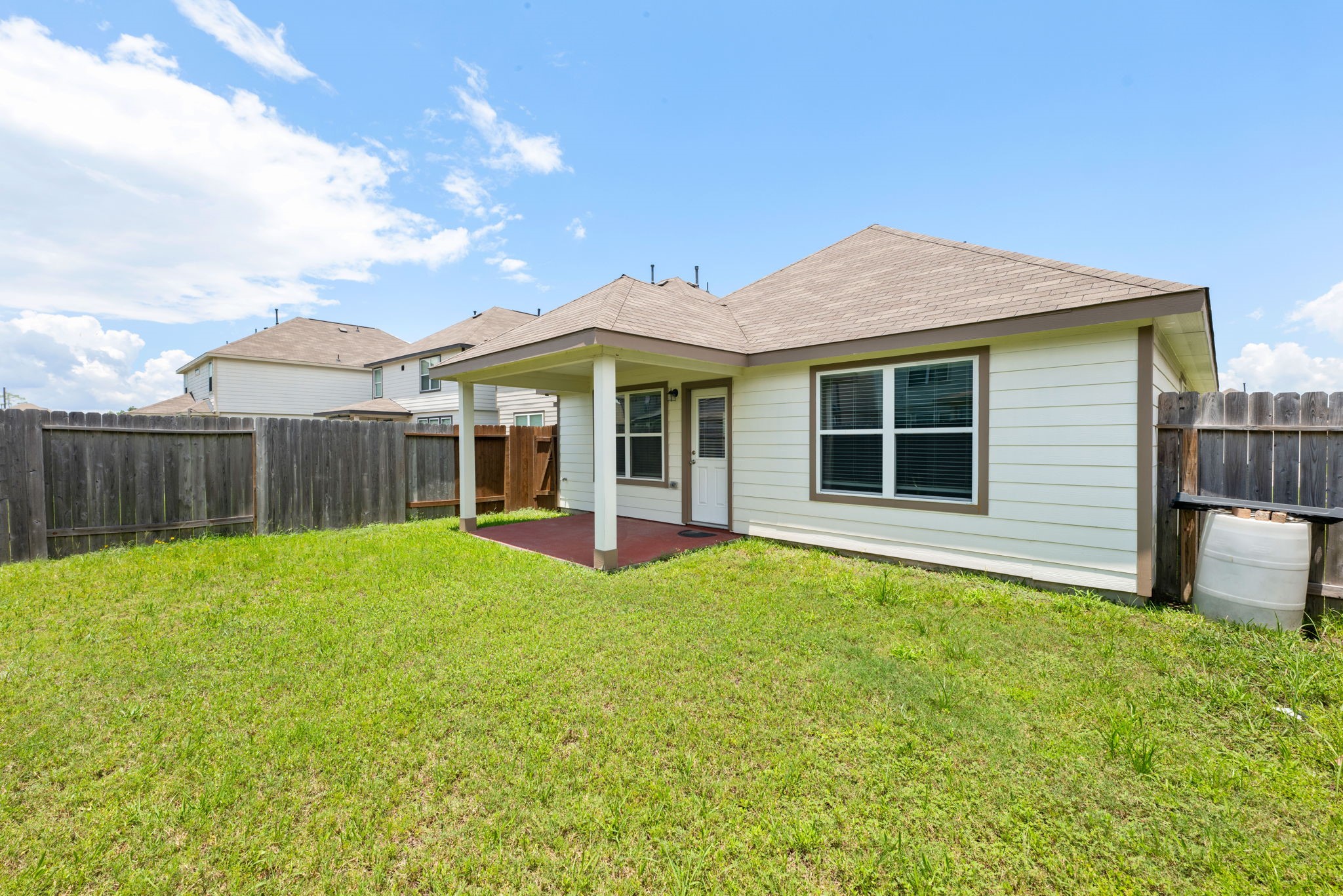 17555 Greystanes Road Humble, TX 77346 - Photo 24 of 28 a view of a house with a yard