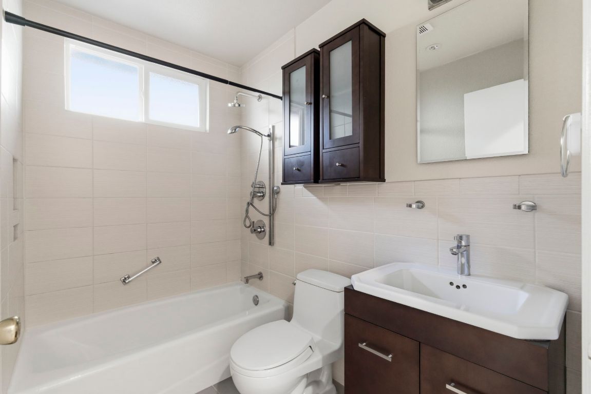 1504 West 39th 1/2 Street Austin, TX 78756 - Photo 15 of 23 a bathroom with a sink toilet and shower