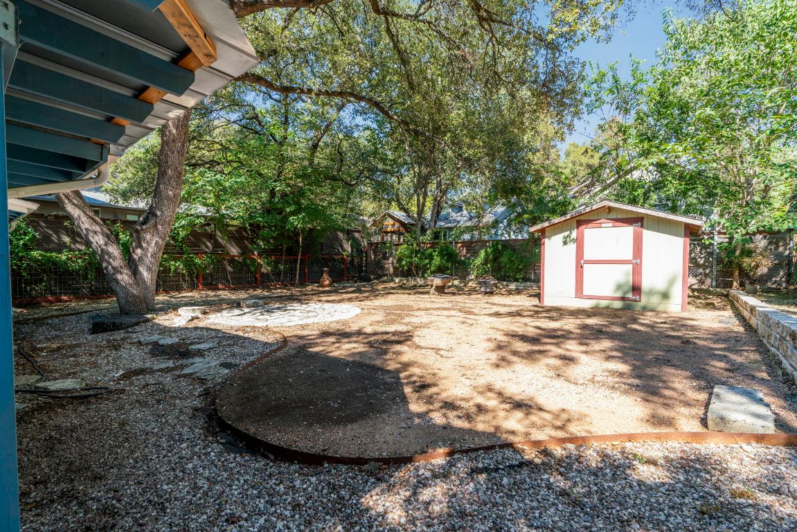 1504 West 39th 1/2 Street Austin, TX 78756 - Photo 19 of 23 a view of a house with a yard