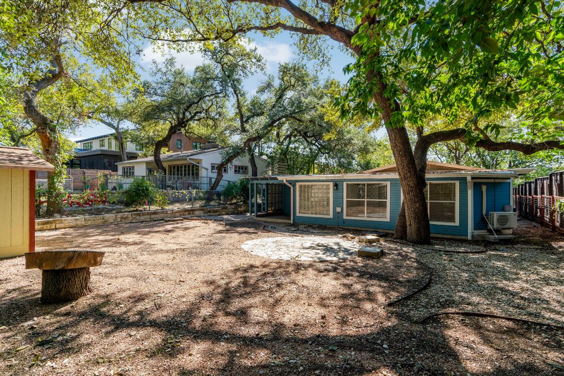1504 West 39th 1/2 Street Austin, TX 78756 - Photo 22 of 23 a backyard of a house with yard table and chairs