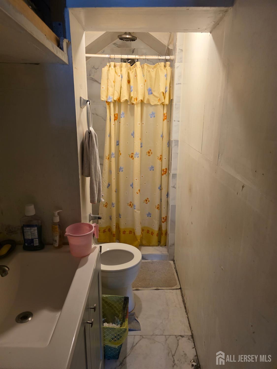 201 Summerhill Road Spotswood, NJ 08884 - Photo 7 of 7 a bathroom with a sink a toilet and shower