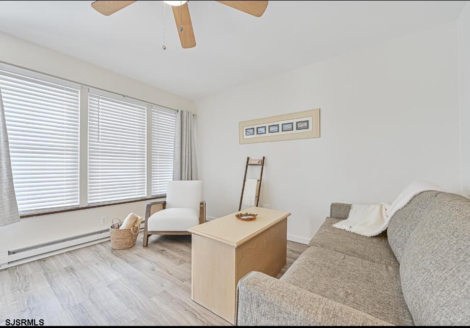 413 East Brigantine Avenue, Unit 28 Brigantine, NJ 08203 - Photo 7 of 20 a living room with furniture and a window