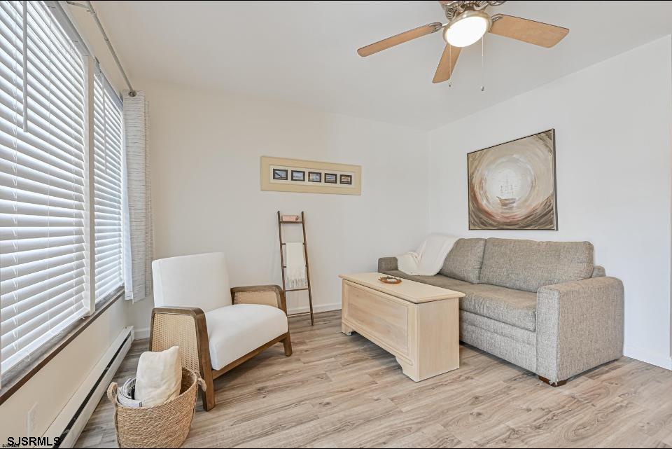 413 East Brigantine Avenue, Unit 28 Brigantine, NJ 08203 - Photo 9 of 20 a living room with furniture and a window