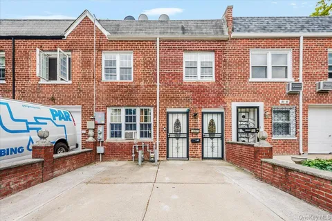 a front view of a house with outdoor space