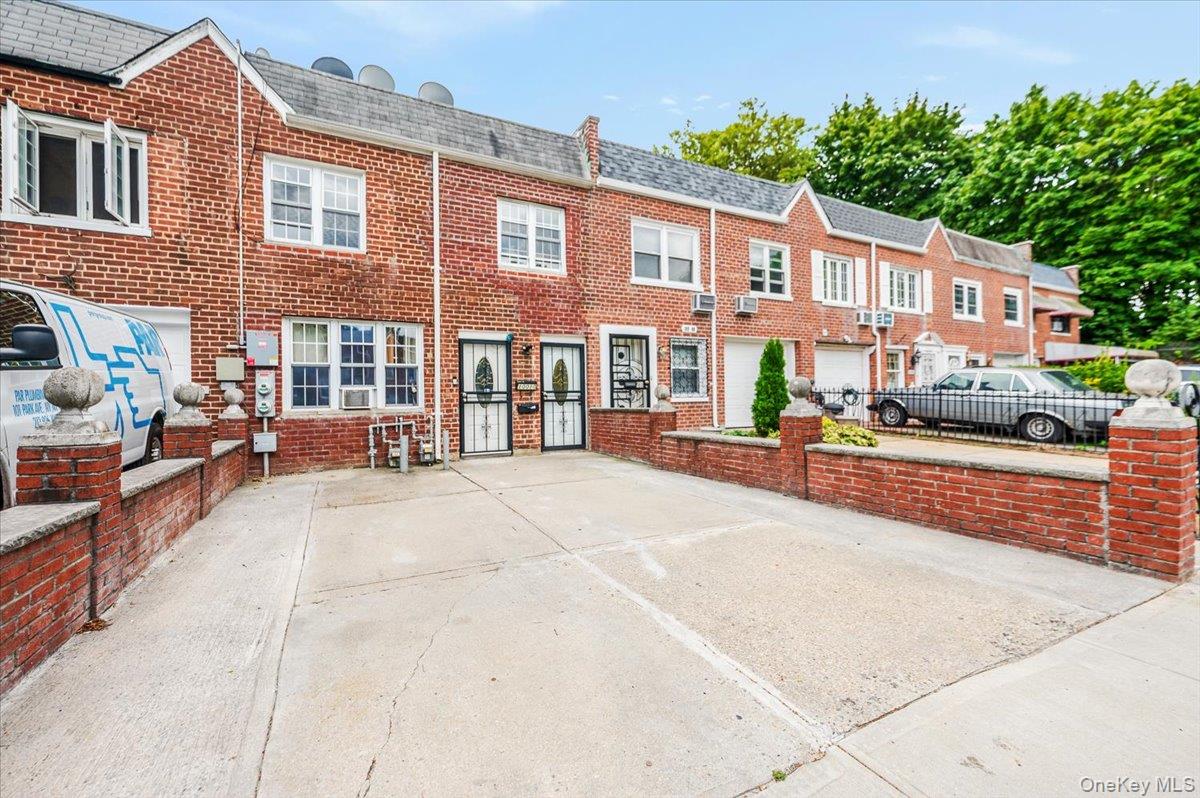 10010 133rd Avenue Queens, NY 11417 - Photo 2 of 22 a view of a building with cars park