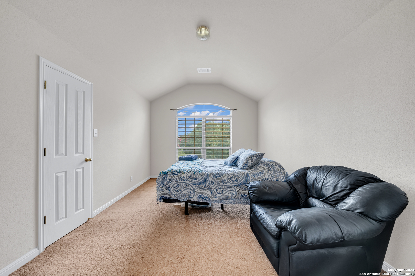 9243 McCafferty Drive Helotes, TX 78023 - Photo 22 of 40 a living room with furniture and a window