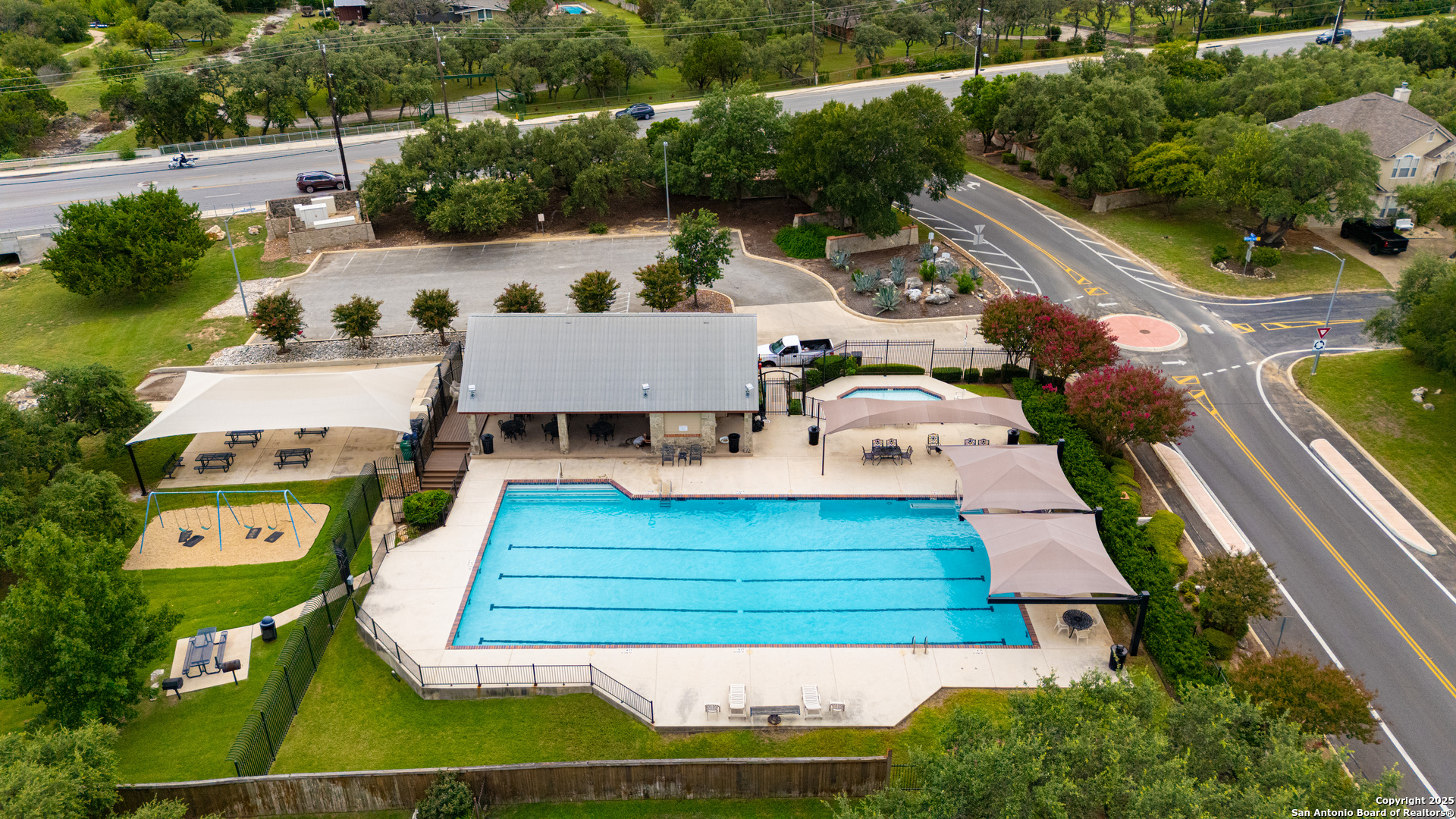 9243 McCafferty Drive Helotes, TX 78023 - Photo 37 of 40 an aerial view of a house with garden space and street view