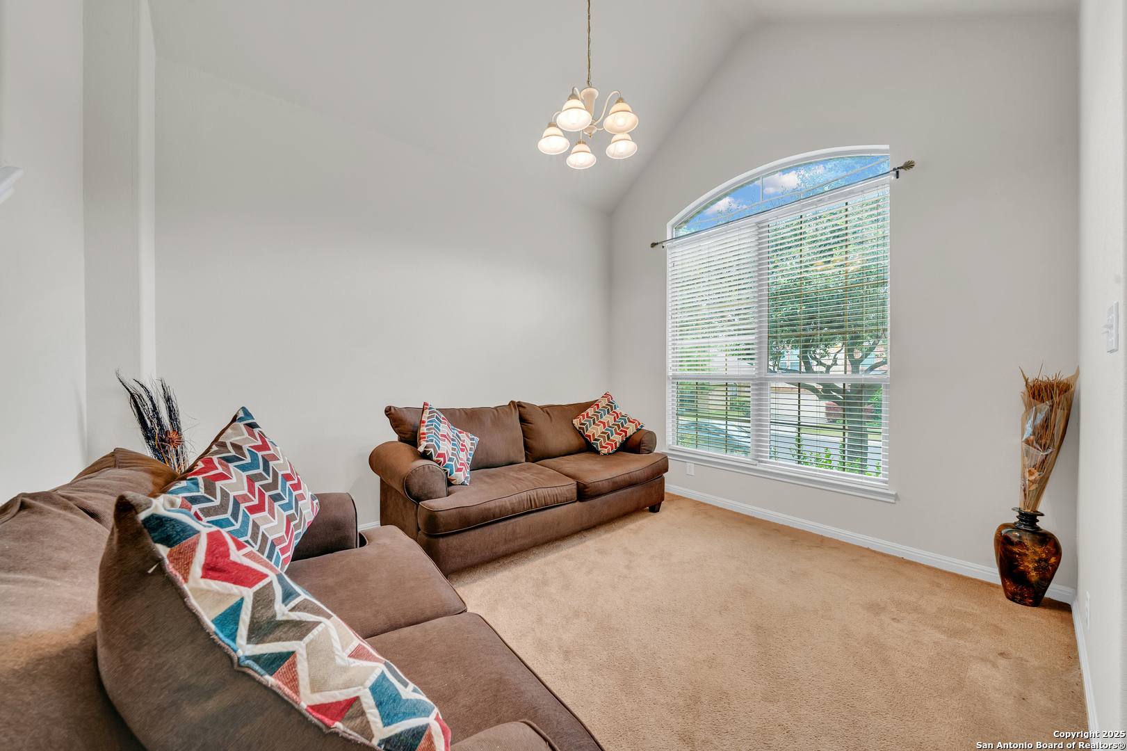 9243 McCafferty Drive Helotes, TX 78023 - Photo 4 of 40 a living room with furniture and a large window