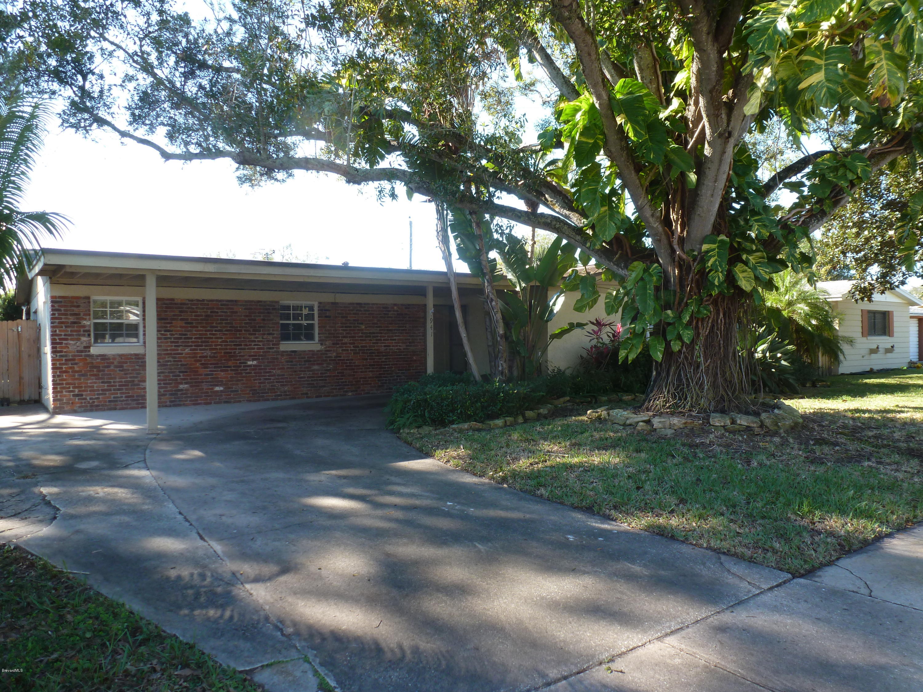 941 Lexington Road Rockledge, FL 32955 - Photo 2 of 16 Large 1 Car Carport